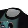 Close-up of a t-shirt featuring a graphic of a panda's head wearing a blue baseball cap.