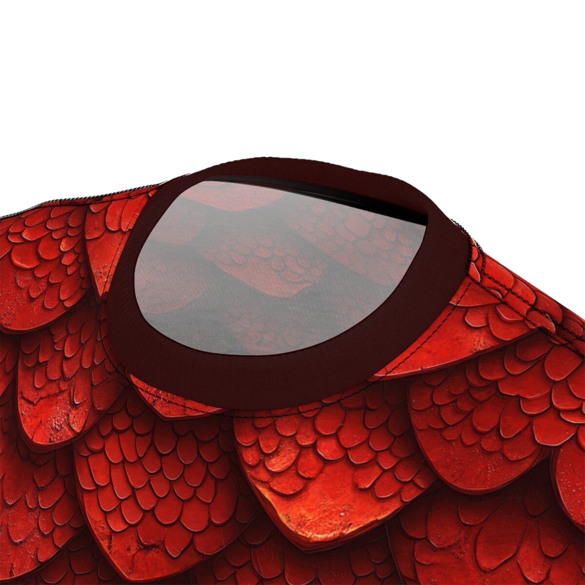 Close up view of a red shirt featuring a textured dragon scale pattern with a dark brown crew neck collar.