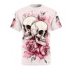 White all over print t-shirt with pink watercolor splashes, featuring two realistic skulls and blooming roses. Streetwear aesthetic design.