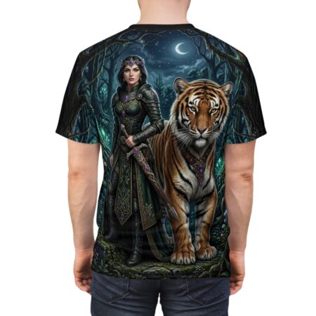 Warrior queen in green armor and tiger stand in a dark forest under a crescent moon, featuring a fantasy graphic sublimation tee.