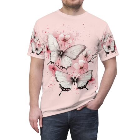 White butterflies and pink cherry blossoms wrap around sublimation tee with a pink watercolor splash background.