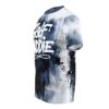 All over print sublimation tee with abstract blue and white splatter graphic and white 'Wolf Baddie' text.
