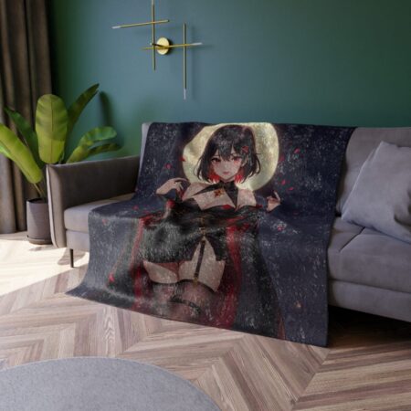 Anime girl with red eyes and black hair printed on a dark blanket with a moon and falling petals graphic.