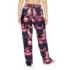 Black cat and smiling pumpkin Halloween all over print pajama pants with a seamless sublimation design.
