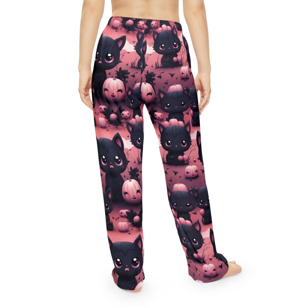 Black cat and smiling pumpkin Halloween all over print pajama pants with a seamless sublimation design.