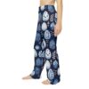Blue all over print pajama pants with a seamless vintage pattern of ornate Easter eggs and floral motifs.