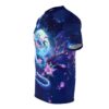 Blue snake coiled on a branch with cherry blossoms against a full moon and starry night sky on a graphic t-shirt.