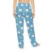 Blue striped pajama pants featuring an all-over print of cute cat faces and white daisies with yellow centers.