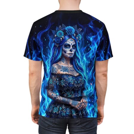 All over print sublimation tee featuring a blue sugar skull woman with floral crown, surrounded by blue flames. Seamless print design.