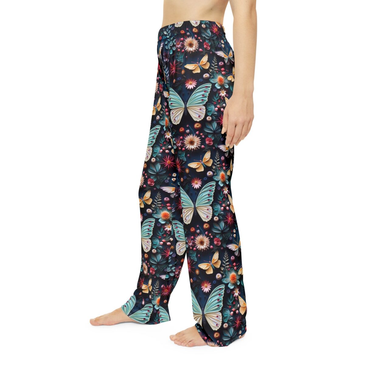 Dark floral pajama pants with large blue butterflies and scattered small flowers. Seamless print design.