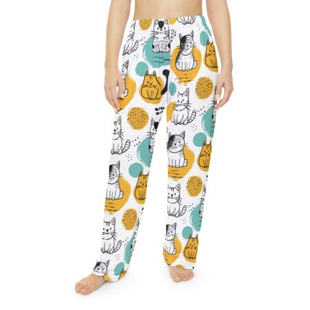 White pajama pants with all over print of cute cats, yellow circles, and teal ovals. Seamless sublimation tee design.