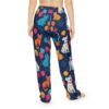 Navy blue pajama pants with a seamless all over print of cartoon cats, dogs, and balloons.