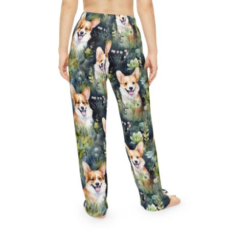 All over print pajama pants featuring a watercolor corgi dog graphic in a garden setting.