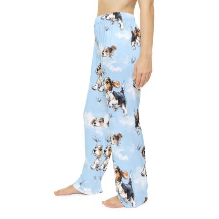 Light blue pajama pants with a repeating watercolor-style print of beagle puppies and butterflies. Features all over print.