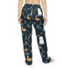 Cute cats and ducks in a pond, all over print pajama pants with floral and grass accents on dark blue.