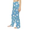 Blue striped pajama pants with an all over print of cute cat faces and daisies.