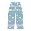 Blue pajama pants with an all-over print of cute cartoon cat faces and small white flowers on horizontal blue and yellow stripes.