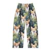 All over print pajama pants featuring cute watercolor corgis smiling amidst a dark green floral garden graphic.