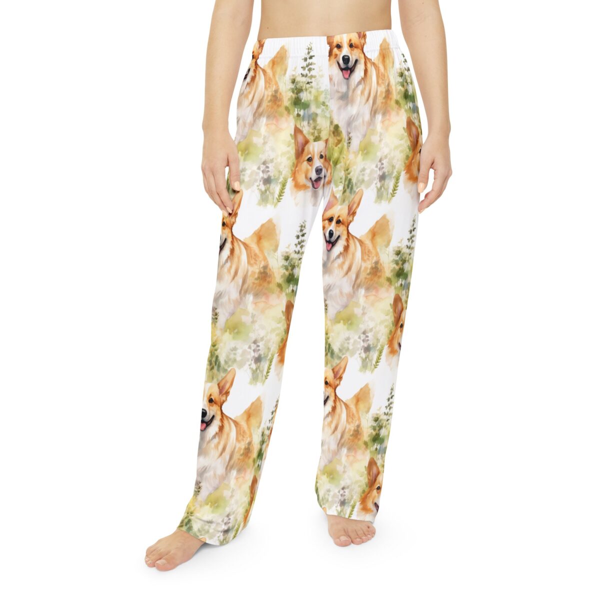 Pajama pants featuring a seamless all over print of happy corgi dogs in a whimsical forest watercolor design.
