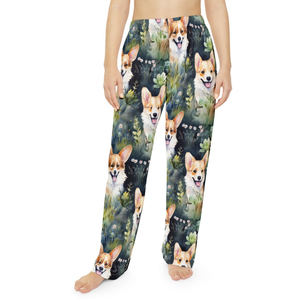 All over print pajama pants featuring a cute watercolor corgi dog graphic amidst green foliage and small white flowers, perfect for pet lovers.