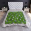Cute cartoon donkey all over print fleece blanket with daisies on green grass background.