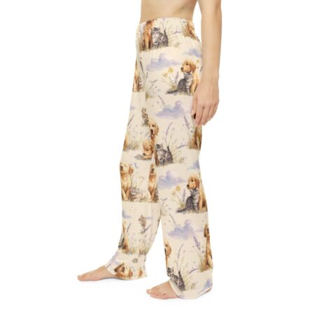Cream all over print sublimation pajama pants featuring a seamless pattern of cute golden retriever puppies and kittens with lavender flowers.