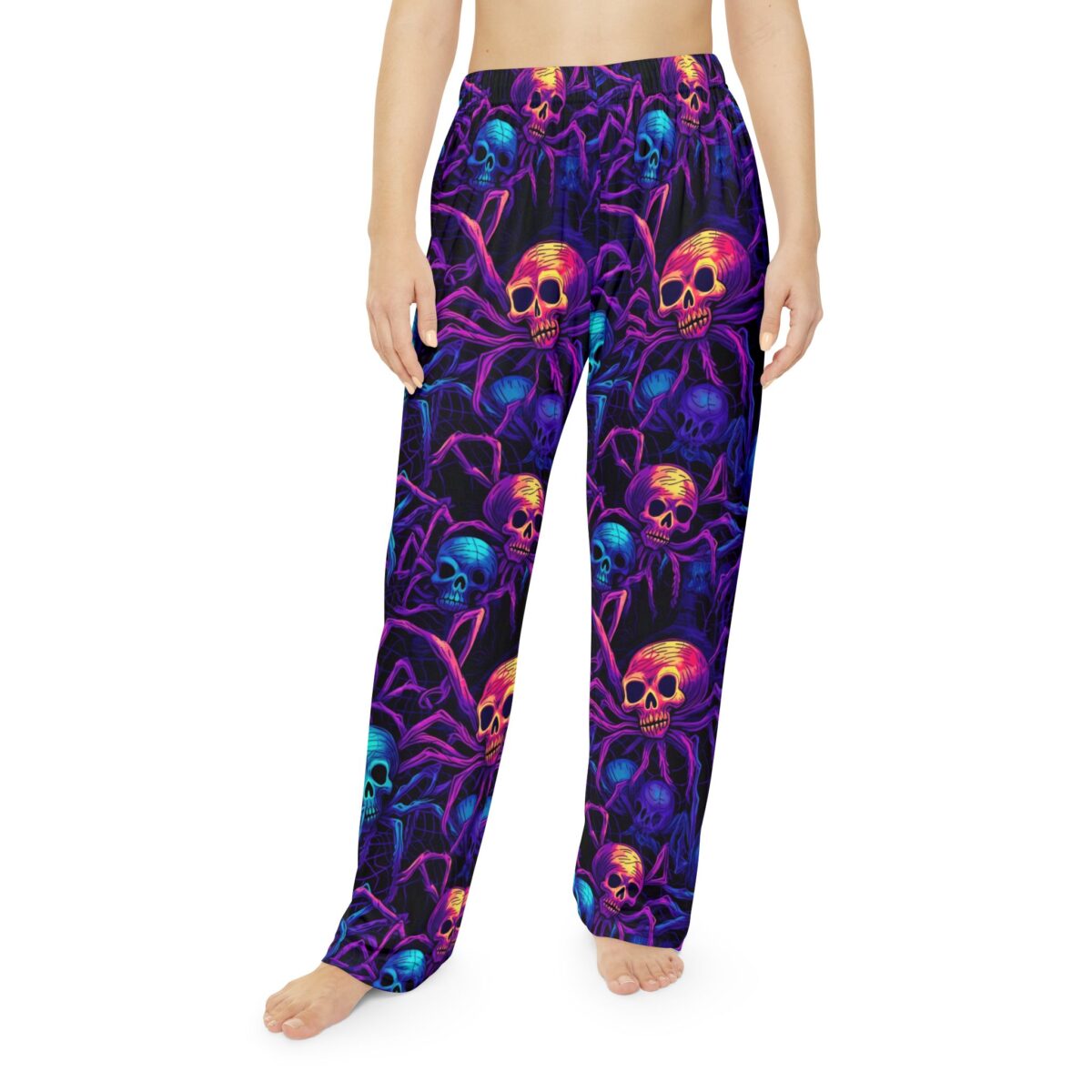 Cyber grunge skull and spider all over print pajama pants, featuring a seamless wrap around graphic with neon purple, pink, and blue colors.