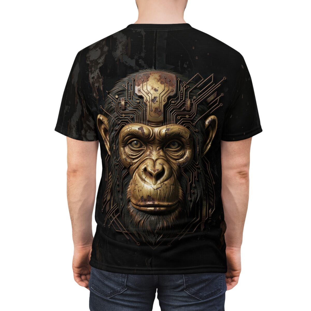 Cyberpunk monkey face graphic on a black t-shirt, featuring intricate gold circuit board details on its head.