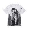 Cyberpunk woman wearing headphones all over print sublimation tee with a city skyline graphic. Streetwear aesthetic design.