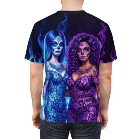 Sugar skull women in blue and purple dresses sublimation tee, featuring vibrant floral patterns and blue flames.