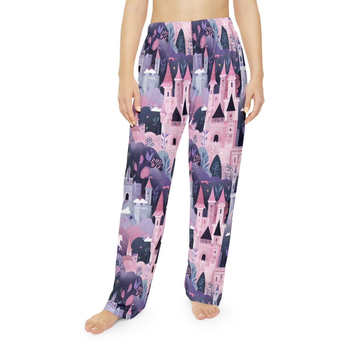 Whimsical castle and unicorn all over print sublimation pajama pants with a dreamy pink and purple fantasy landscape.