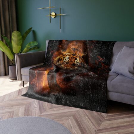 Close-up of a fierce tiger face surrounded by flames on a dark, textured blanket, perfect for a streetwear aesthetic.