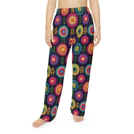 Colorful floral all over print sublimation pajama pants with a dark background and leaf accents.