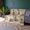 Golden retriever puppies and kittens scattered across a soft blanket with a lavender field pattern.