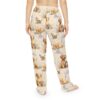 Golden Retriever puppy and tabby kitten all over print pajama pants, featuring watercolor style dogs and cats in grassy fields with lavender and clouds.