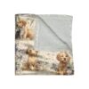 Fluffy golden retriever puppy and tabby kitten sitting together in a field with lavender flowers, soft fleece blanket with all-over print.
