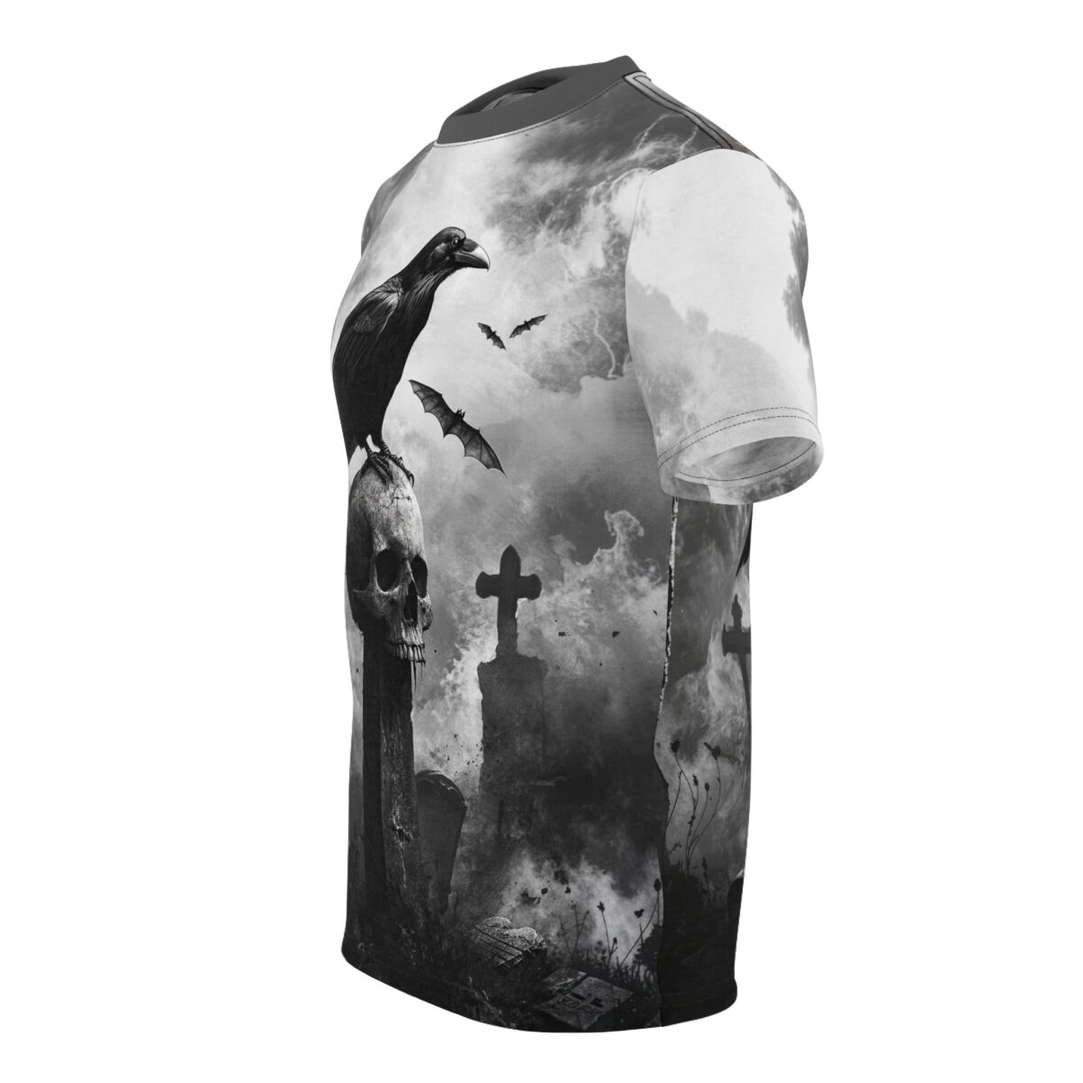 All over print graphic t-shirt featuring a gothic raven perched on a skull, with bats flying near gravestones and a cross in a cloudy graveyard.