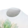 All over print sublimation tee with a seamless green floral watercolor wrap around graphic design.