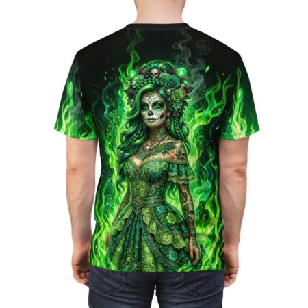 All over print sublimation tee featuring a green-hued sugar skull woman in a detailed dress surrounded by flames and roses.