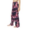 Cute black cat and pumpkin Halloween pajama pants with a pink background, featuring a seamless, all-over print design.