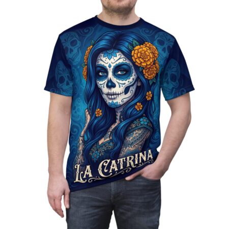 La Catrina sugar skull graphic all over print sublimation tee features a woman with blue hair, intricate face paint, and orange flowers.