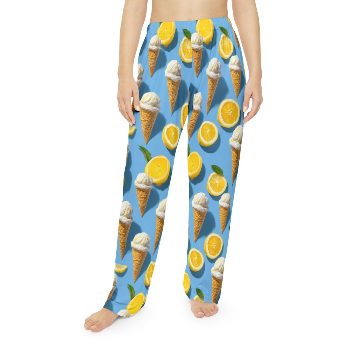 Blue all over print pajama pants with repeating ice cream cone and lemon slice graphics. Features sublimation tee pattern.