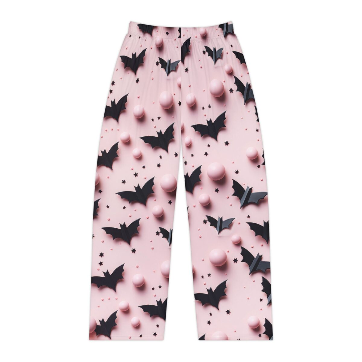 Pink pajama pants with all over print of black bats, pink spheres, and small stars. Seamless wrap around graphic design.