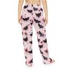 All over print pajama pants with black bats and pink spheres on a light pink background, featuring a seamless, retro repeat print design.