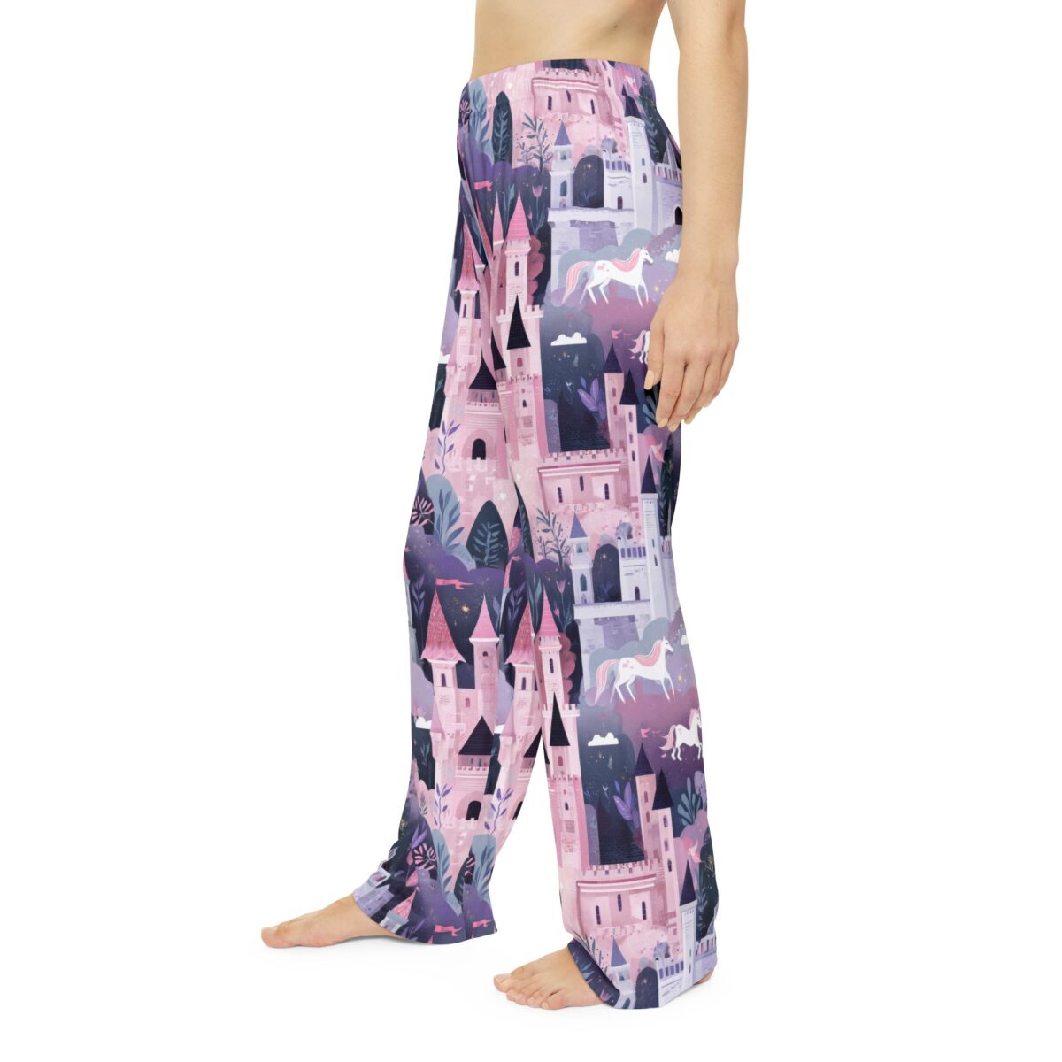 Pink castle and unicorn all over print pajama pants with a seamless wrap around graphic design.