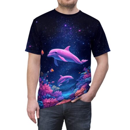 Pink dolphins and coral reef graphic on a black all over print sublimation tee, featuring a starry night sky and ocean life.