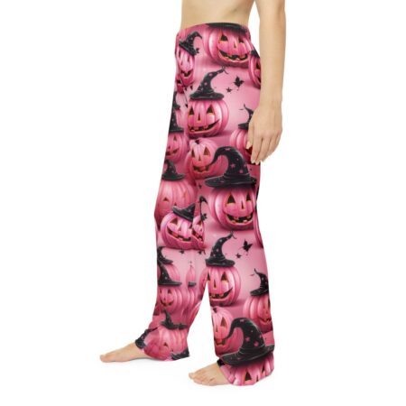 All over print pink pumpkin and witch hat seamless sublimation pajama pants, perfect for Halloween or spooky season. Wrap around graphic design.