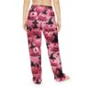 Pink pumpkin and witch hat pajama pants with all over print design.