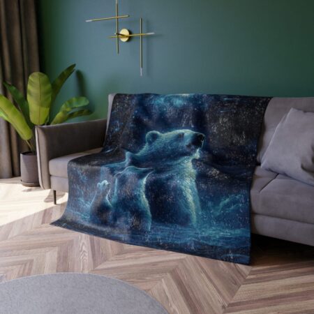 Cozy polar bear family blanket featuring a mother and cubs in a starry, dark blue night sky graphic.