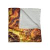 Psychedelic floral and flame pattern all over print throw blanket featuring vibrant orange, yellow, and brown swirling designs and decorative motifs.